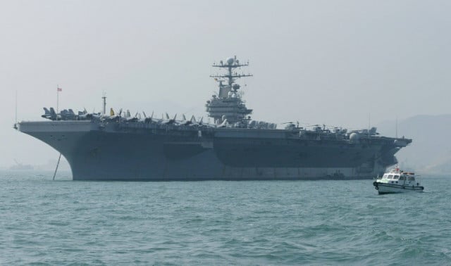 US sends naval strike group to Middle East in 'message' to Iran