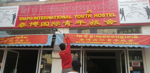 Chinese-Owned Hostel Sign Removed in Siem Reap City