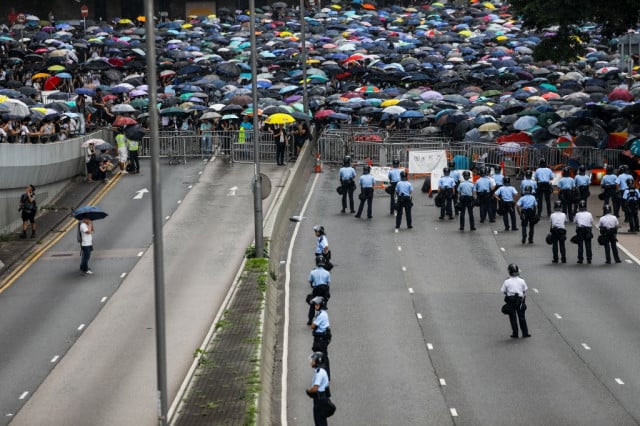 Protests against China extradition bill paralyse Hong Kong