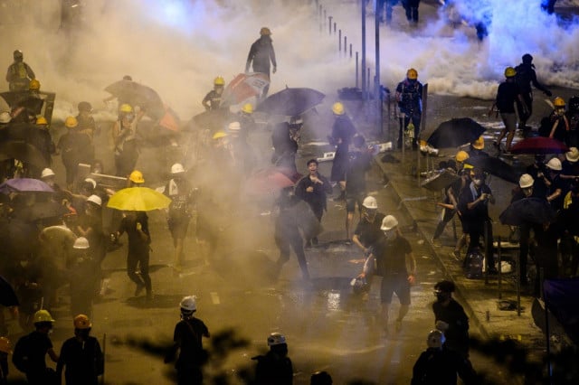 First charges against Hong Kong anti-government protester