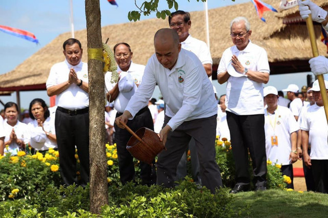 King Sihamoni urges Cambodians to plant trees, inviting newlyweds to do so at their weddings
