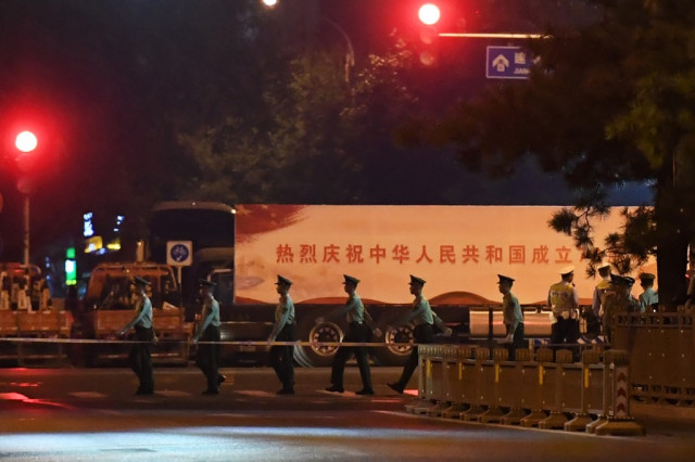 Central Beijing locked down for overnight army parade rehearsal