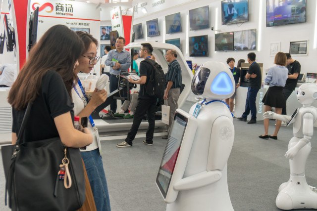 Tech China Weekly: AI pilot zones; robot standard; artificial heart; 5G base stations