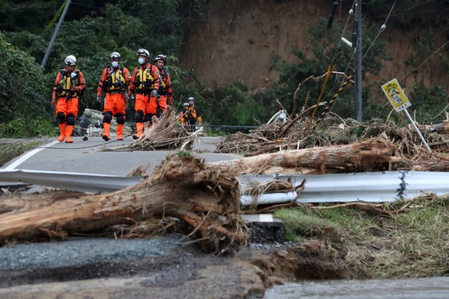 Rescuers hunt for missing as landslides, floods kill 10 in Japan