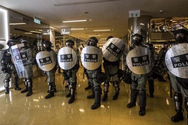 Hong Kong pro-democracy lawmakers arrested as tensions soar