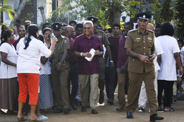 Rajapaksas eye comeback in tense Sri Lanka election