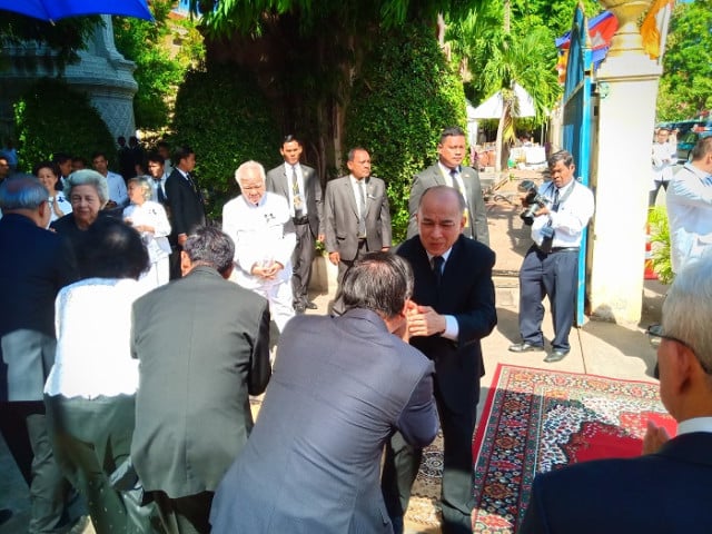 King Norodom Sihamoni Mourns Princess Buppha Devi at her Funeral