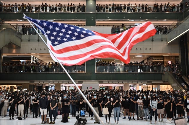 China threatens 'countermeasures' after Trump signs Hong Kong bill