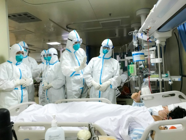 Wuhan hospitals receive over 15,000 fever patients daily
