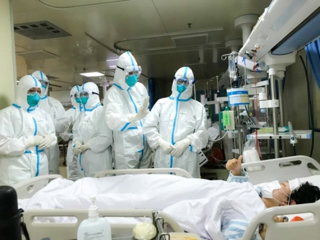 Wuhan hospitals receive over 15,000 fever patients daily