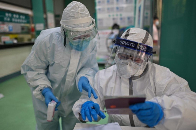 China's Wuhan raises virus death toll by 1,290, up 50%