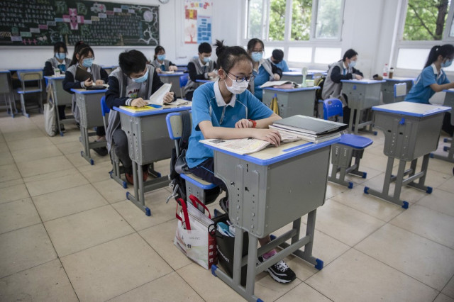  Students in China's virus centre Wuhan return to school