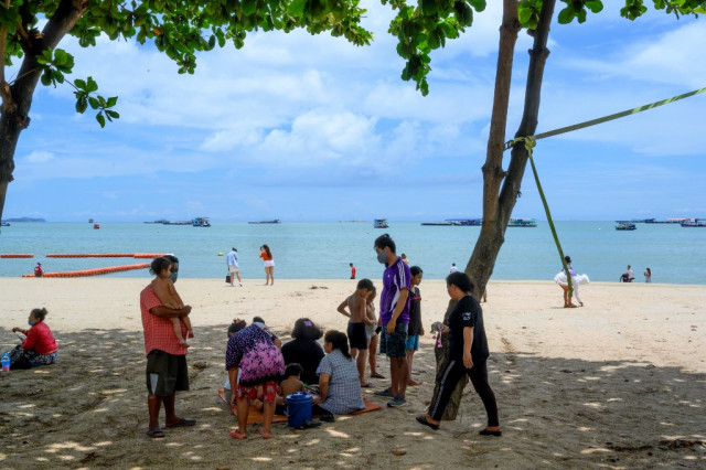 Thais seek sun and surf as officials re-open some beaches