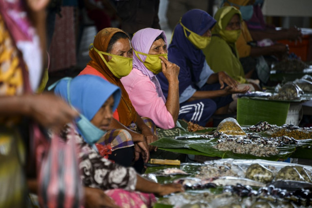 Indonesian politician's anti-virus veil policy draws fire