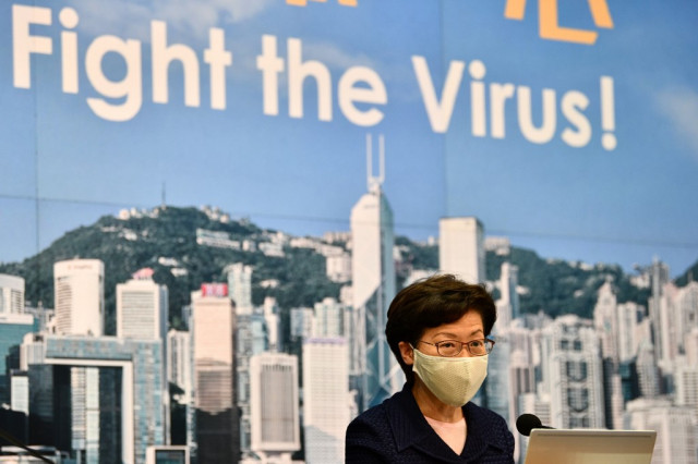 Hong Kong postpones elections over virus as China crackdown deepens