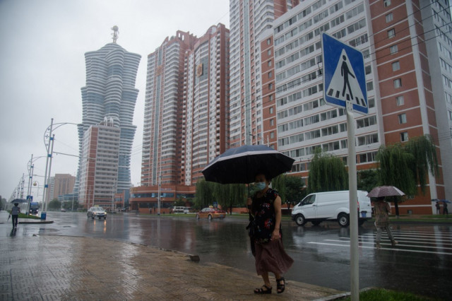 North Korea on flood alert as heavy rain kills 16 in South