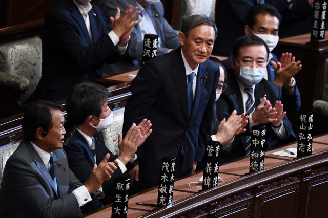 Japan's new PM Suga pledges to tackle virus, kickstart economy