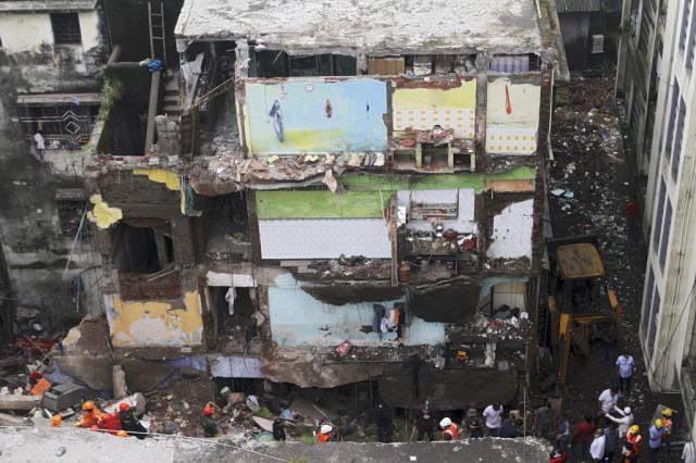 Ten dead, up to 25 feared trapped in India building collapse