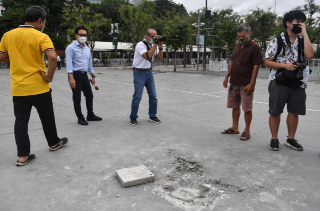 Thai protesters vow to fight after 'people's plaque' removed