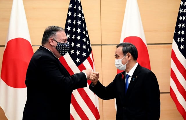 Pompeo slams China's 'corruption, coercion' at Tokyo talks