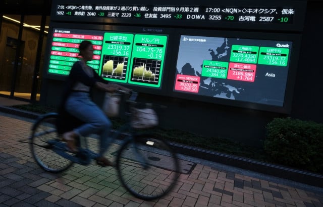 Asian markets slip as vaccine halt dents optimism