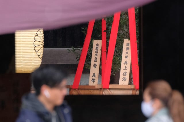 Japan PM Suga sends offering to controversial war shrine