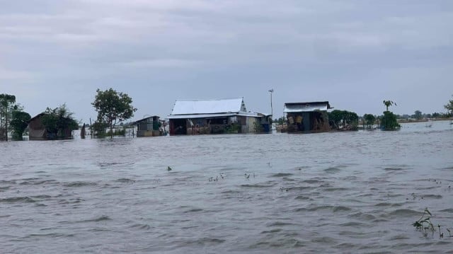 Father Dies Trying to Save Son as Flood Deaths Rise to 34