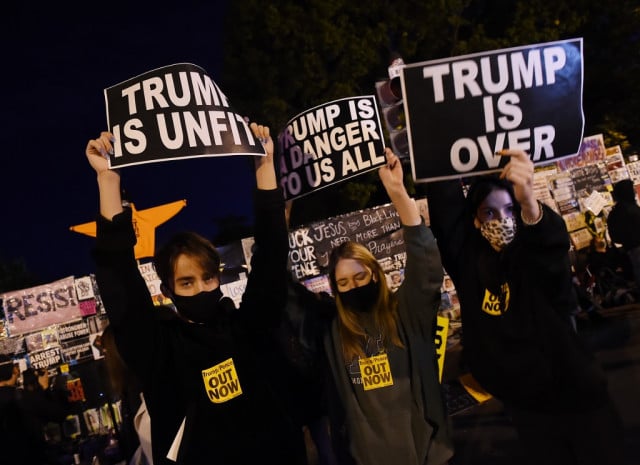 'Vote him out!': Nerves and cheer among Biden supporters at White House