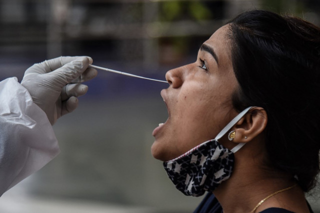 India's coronavirus cases pass 10 million