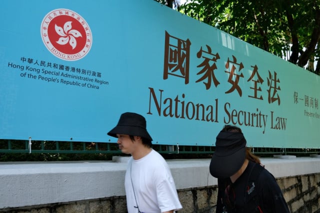 Dozens of Hong Kong opposition figures arrested under security law