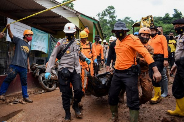 Indonesia landslides kill at least 11, scores missing