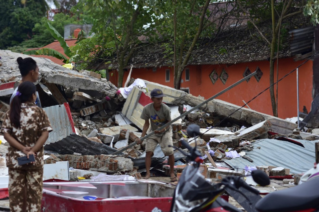 Indonesia hunts for survivors as quake death toll hits 56