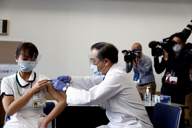 Japan starts vaccine rollout with healthcare workers