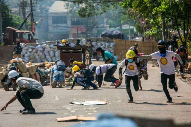 Myanmar military forces civilians to dismantle Yangon barricades