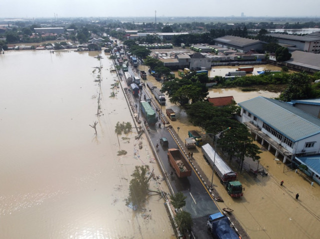 Indonesia flash floods kill 23, leave two missing