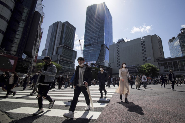 Japan faces new virus emergencies, three months before Olympics