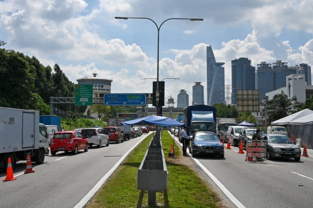 Malaysia imposes lockdown as Southeast Asia battles virus surge