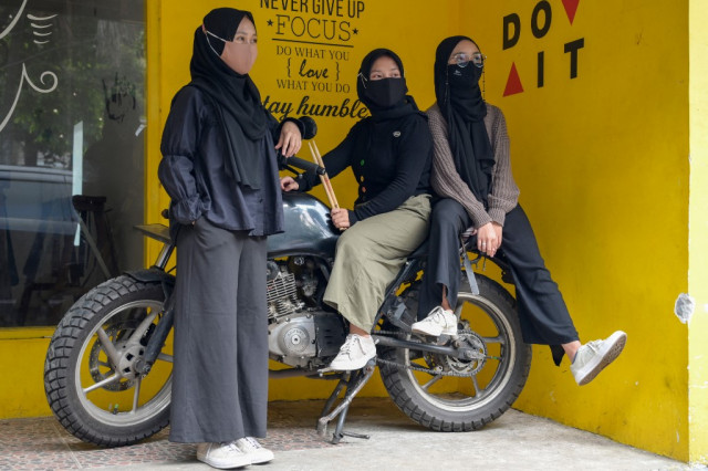 Indonesia's hijab headbangers trade village life for metal heaven