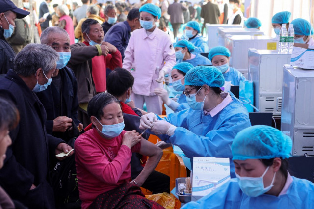 China vaccine doses pass one billion mark