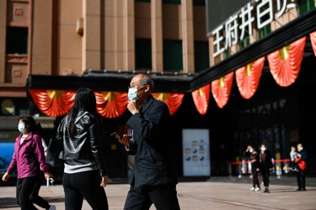 China growth slowed sharply to 7.7% in second quarter: AFP poll