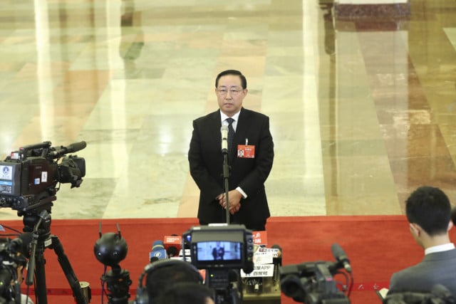 China launches investigation into former justice minister