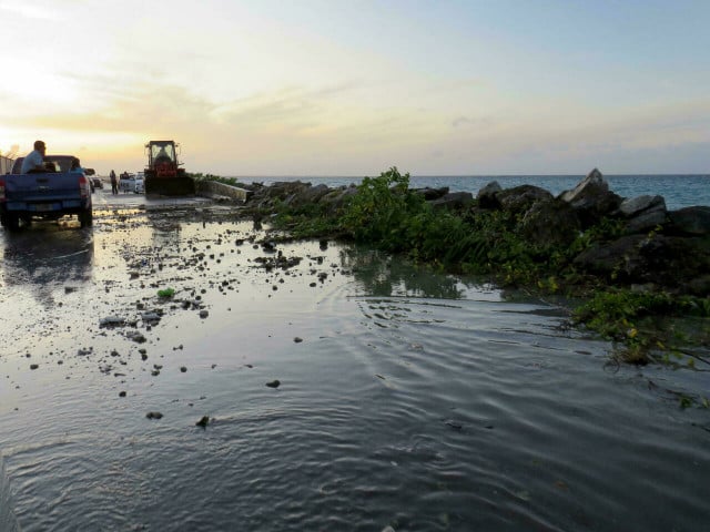 Rising seas blamed as flooding hits Pacific islands