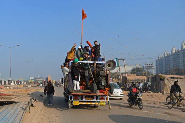 Indian farmers head home after year-long protest