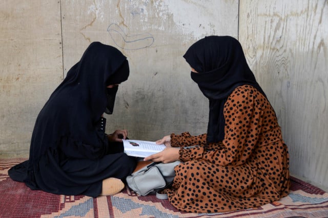 Hope and fear as Afghan girls prepare for return to school