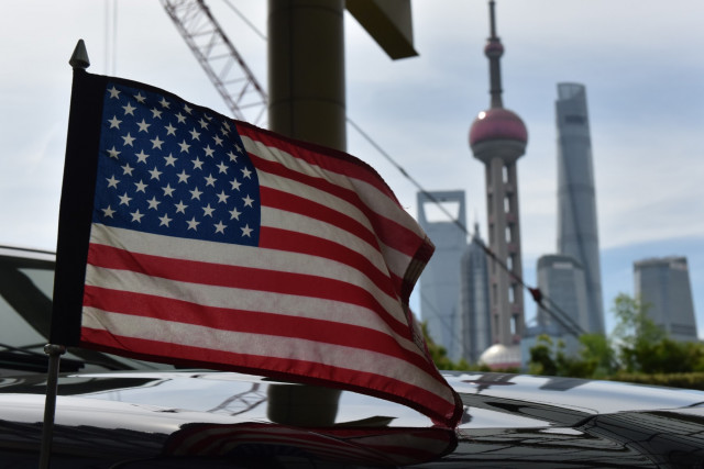 US orders non-essential staff to leave Shanghai as virus surges