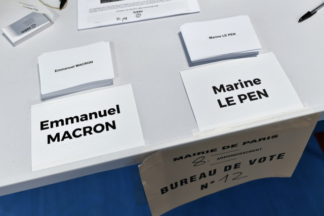 Macron battles far-right Le Pen for French presidency