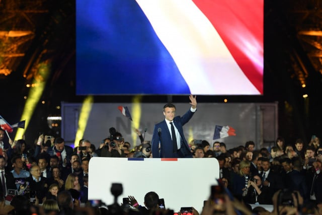 France's Macron wins new term after far-right battle