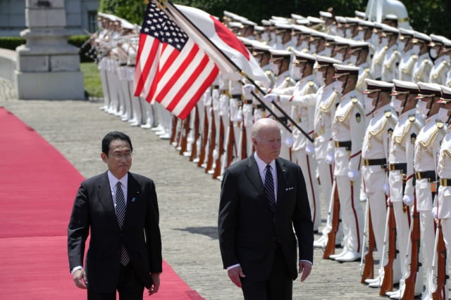 Biden reinforces Japan ties, unveils Asia trade initiative