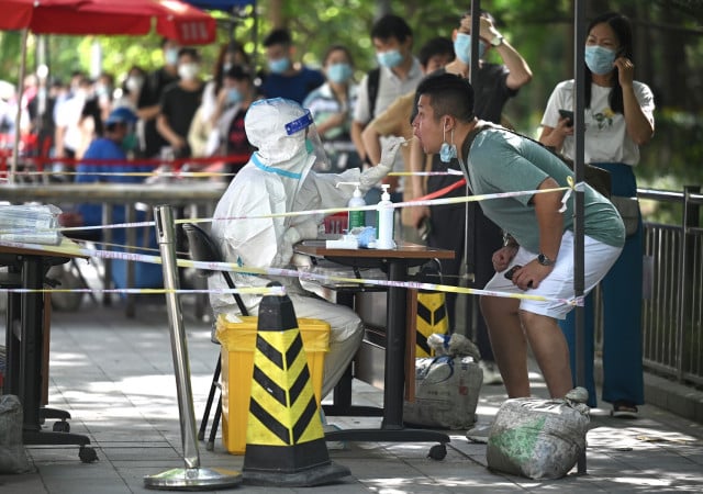 China Covid outbreak grows with millions under lockdown