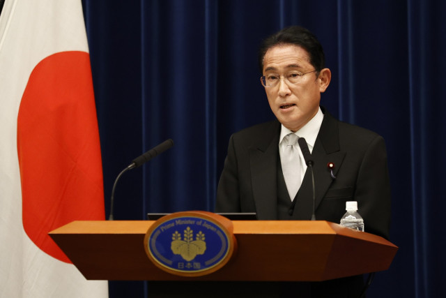 Japan PM reshuffles cabinet as approval ratings slide